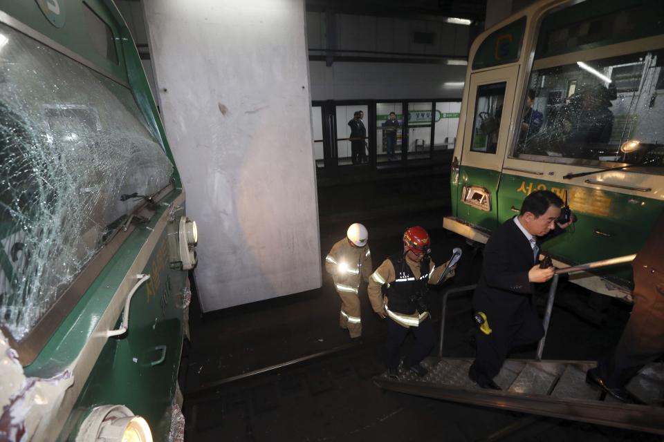 Damaged subway trains are seen at a subway station in Seoul May 2, 2014. (REUTERS/Park Dong-ju/Yonhap)