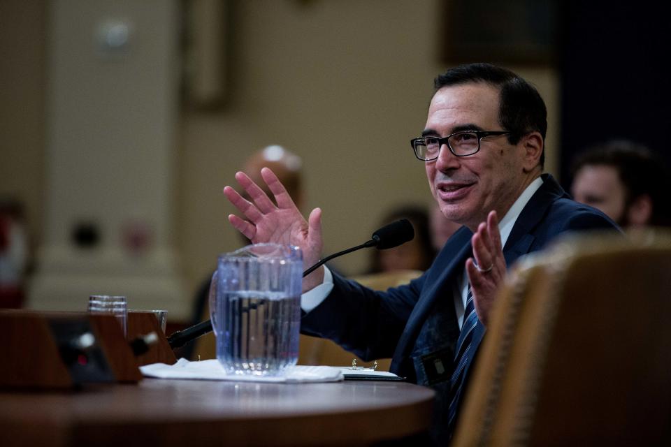 Steven Mnuchin, U.S. Treasury secretary, speaks during a House Ways and Means Committee hearing in Washington, D.C., U.S., on Thursday, March 14, 2019. Mnuchin said if Congress sends him a request for President Donald Trump's tax returns, he'll consult with the agency's legal department and follow the law. Photographer: Anna Moneymaker/Bloomberg via Getty Images