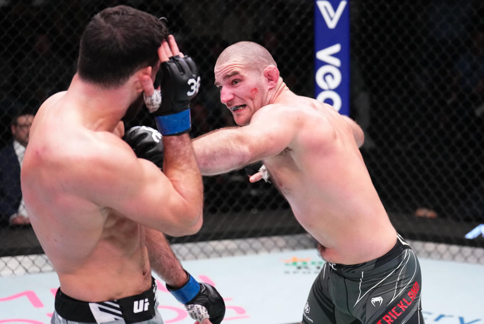 LAS VEGAS, NEVADA - JANUARY 14: (R-L) Sean Strickland punches Nassourdine Imavov of Russia in a light heavyweight fight during the UFC Fight Night event at UFC APEX on January 14, 2023 in Las Vegas, Nevada. (Photo by Chris Unger/Zuffa LLC via Getty Images)