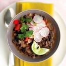 <p>Satisfying bean soups often have to simmer for hours; this vegetarian stew tastes as if it did but uses canned beans and broth as shortcuts.</p><p>Get the recipe from <a href="https://www.delish.com/cooking/recipe-ideas/recipes/a17655/cuban-black-bean-stew-rice-recipe-mslo1011/" rel="nofollow noopener" target="_blank" data-ylk="slk:Delish;elm:context_link;itc:0;sec:content-canvas" class="link ">Delish</a>.</p>