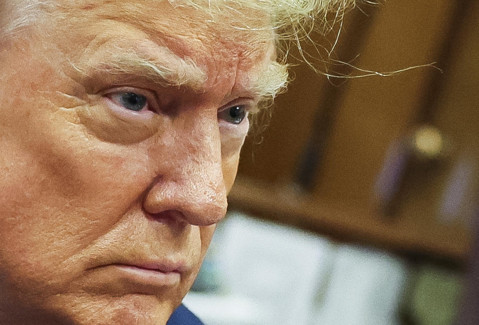 Former President Donald Trump awaits the start of proceedings during jury selection at Manhattan criminal court, Thursday, April 18, 2024 in New York. (Brendan McDermid/Pool Photo via AP)