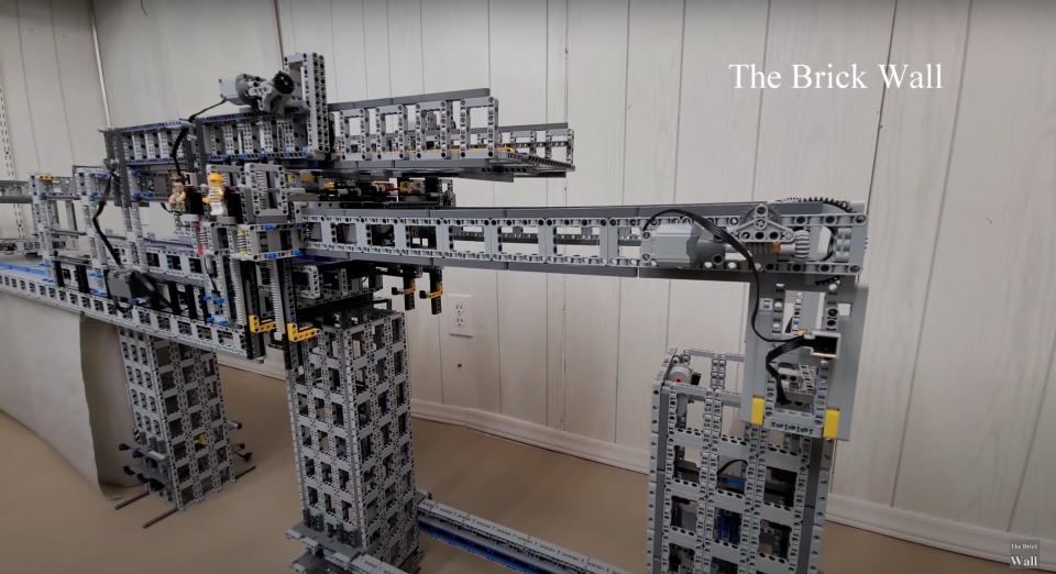 This LEGO bridge-building machine is able to construct bridges up to six feet long, and uses a novel design.