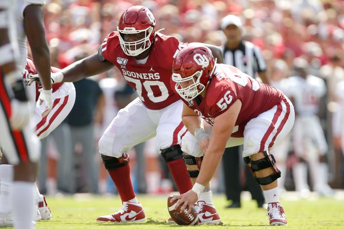 Oklahoma's Creed Humphrey (56) and Brey Walker (70) get ready for a play during a college football game between the University of Oklahoma Sooners (OU) and Texas Tech University at Gaylord Family-Oklahoma Memorial Stadium in Norman, Okla., Saturday, Sept. 28, 2019. Oklahoma won 55-16. [Bryan Terry/The Oklahoman]