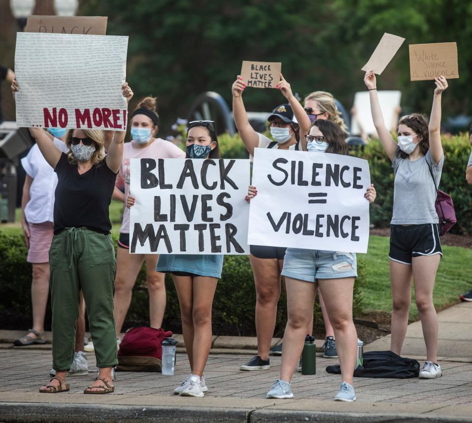 Protesters gather in Franklin’s Public Square in honor of George Floyd and others who have been killed by police Thursday, June 4, 2020.