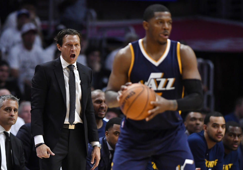 Utah Jazz coach Quin Snyder, left, yells to forward Joe Johnson during the second half in Game 1 of an NBA basketball first-round playoff series against the Los Angeles Clippers, Saturday, April 15, 2017, in Los Angeles. The Jazz won 97-95. (AP Photo/Mark J. Terrill)