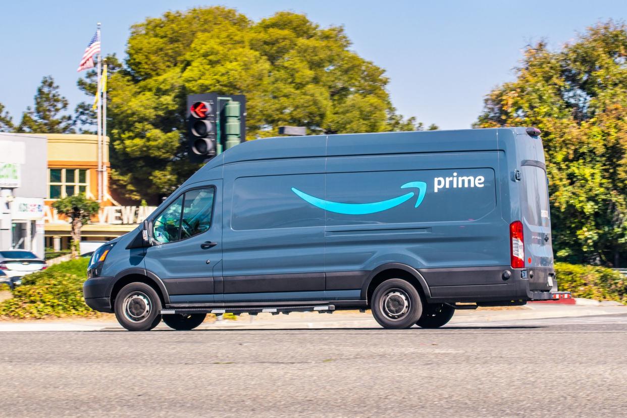 Oct 10, 2019 Mountain View / CA / USA - Amazon van branded with the Amazon Prime logo, making deliveries in San Francisco bay area