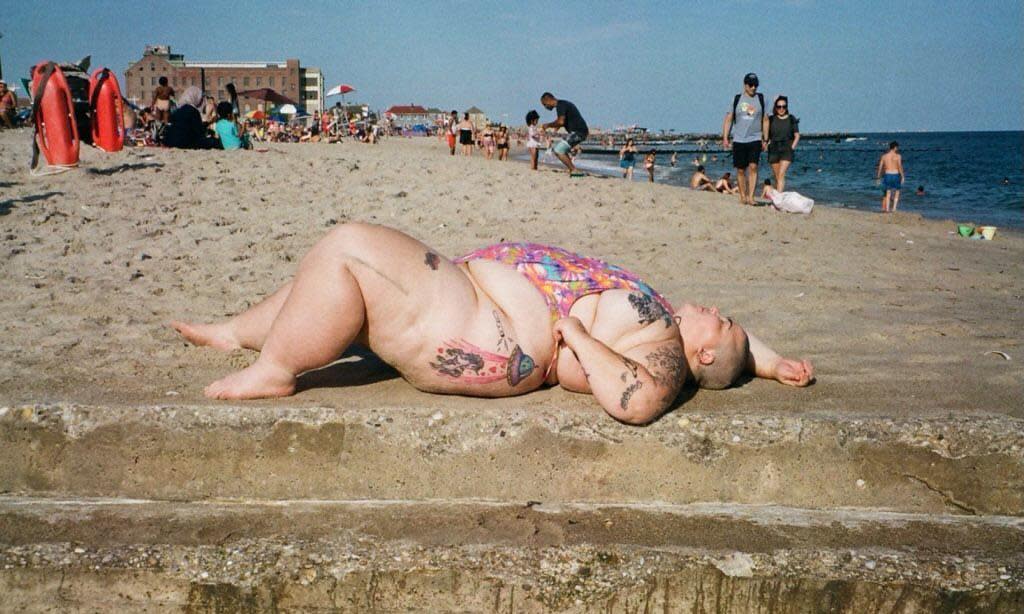 <span>Jordan Underwood at Jacob Riis Beach.</span><span>Photograph: @rlyblonde on Instagram</span>