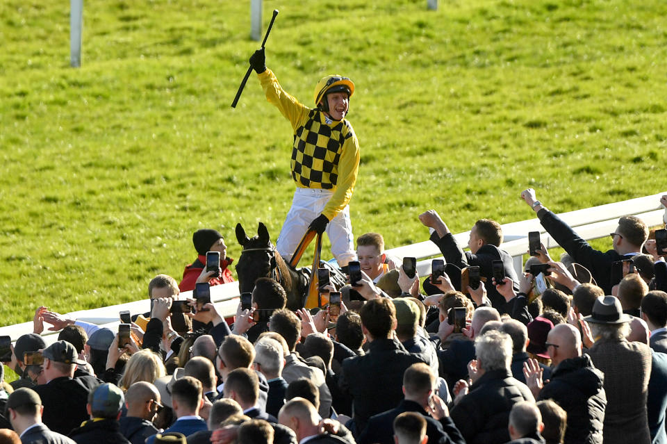 File photo dated 13-03-2020 of Jockey Paul Townend celebrates on Al Boum Photo after winning the Magners Cheltenham Gold Cup Chase.