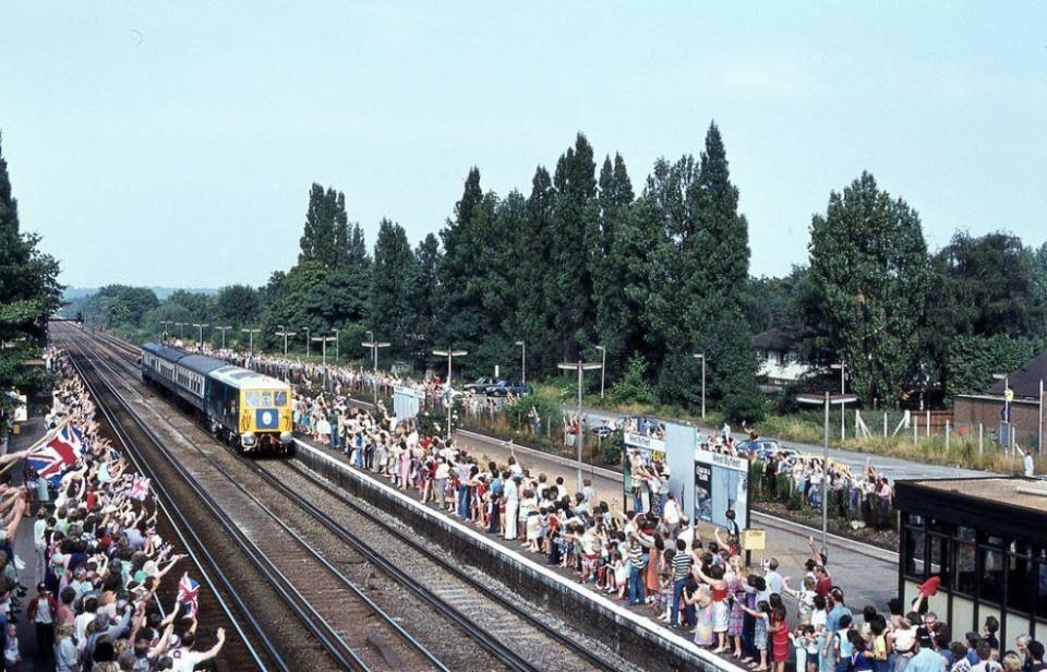 Fans wave at Prince Charles and Princess Diana on train in 1981 (Glen Fairweather )