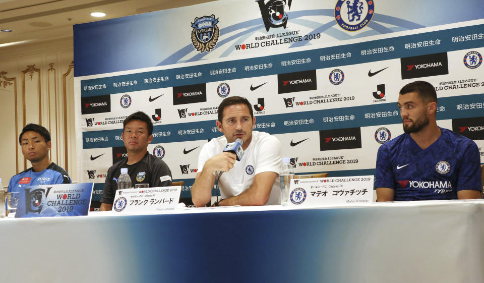 Chelsea manager Frank Lampard, second from right, speaks as his player Mateo Kovacic, right, Kawasaki Frontale manager Toru Oniki, second from left, and player You Kobayashi listen during a press conference in Yokohama, near Tokyo, Tuesday, July 16, 2019. Chelsea will play against J-League's Frontale in a friendly soccer match on Friday. (AP Photo/Koji Sasahara)