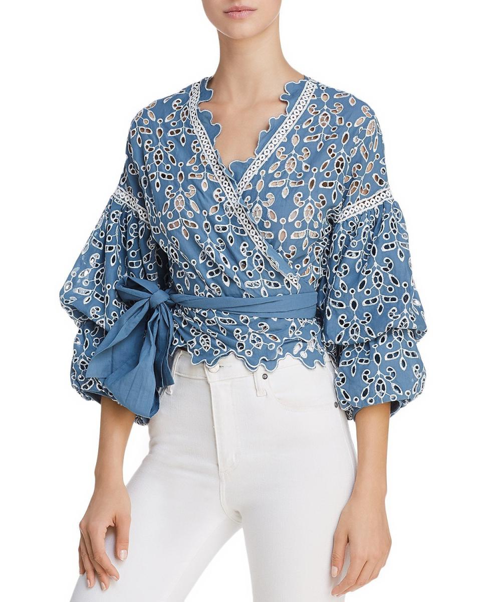 Get it <a href="https://www.bloomingdales.com/shop/product/saylor-eyelet-lace-wrap-top?ID=2804334&amp;CategoryID=2910&amp;linkModule=1#fn=spp%3D4" target="_blank">here</a>.&nbsp;