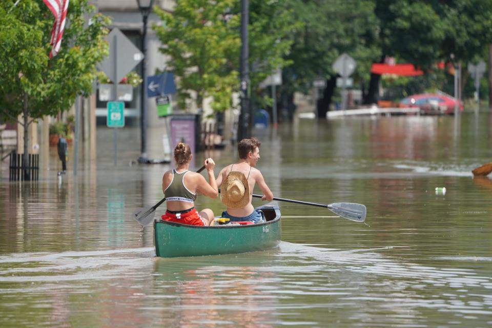 Floodwaters blocked cars and damaging shops in downtown  Montpelier, Vermont, on Tuesday, July 11, after heavy rains swept the area, forcing rivers to overtop their banks.