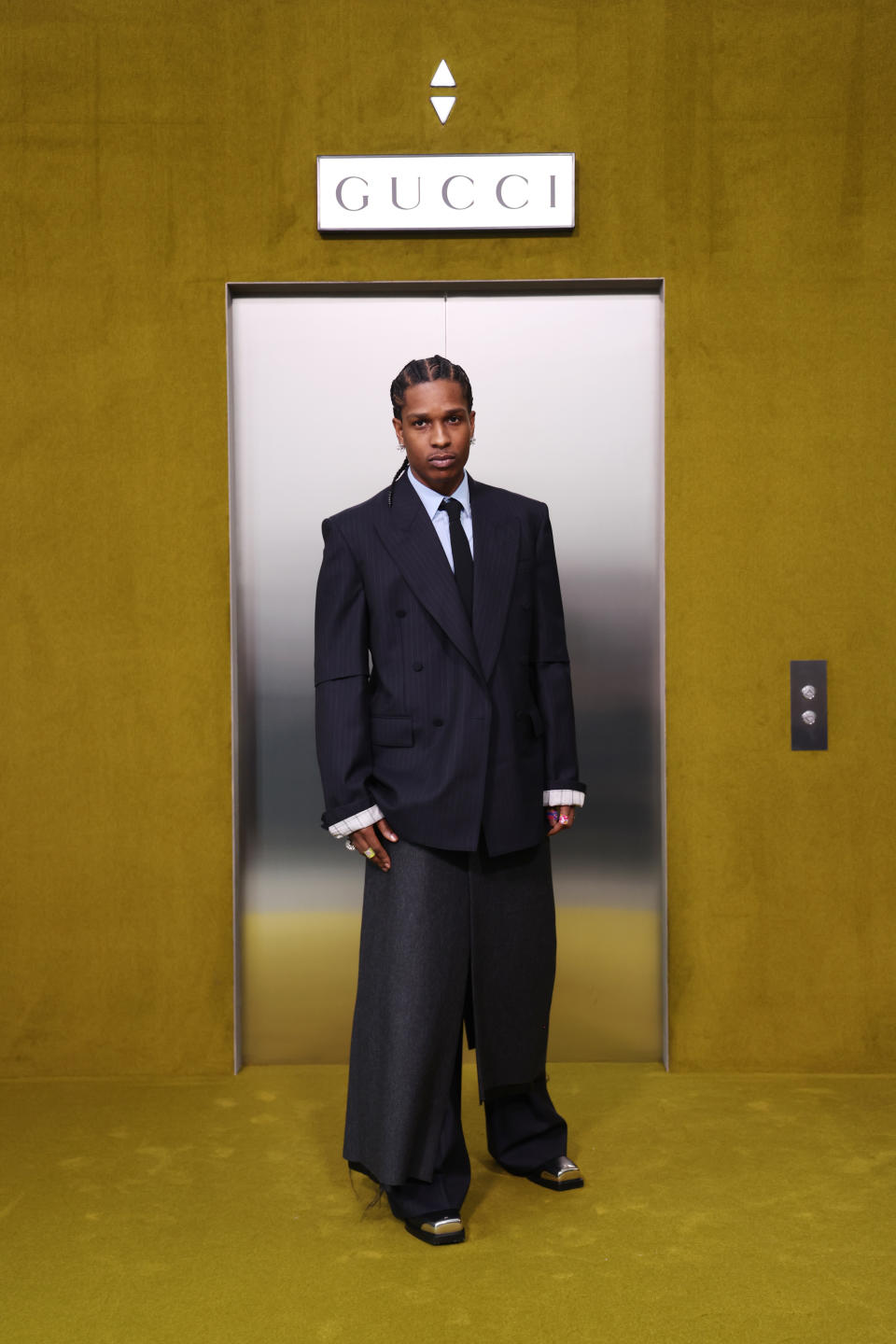 Asap rocky in a black Gucci suit at Milan Fashion Week