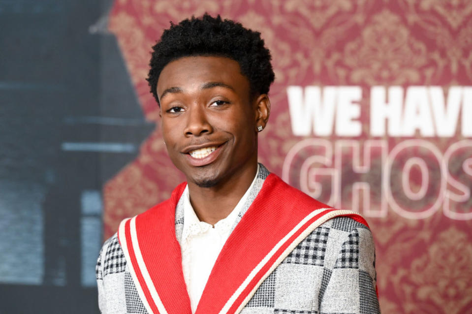 Niles Fitch  smiles at a red carpet event