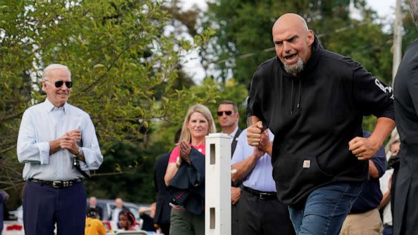 PHOTO: Pennsylvania Lieutenant Governor and U.S. Senate candidate John Fetterman gestures as President Joe Biden looks on as they attend a Labor Day celebration at the United Steelworkers of America Local Union 2227 in West Mifflin, Penn., Sept. 5, 2022. (Elizabeth Frantz/Reuters)