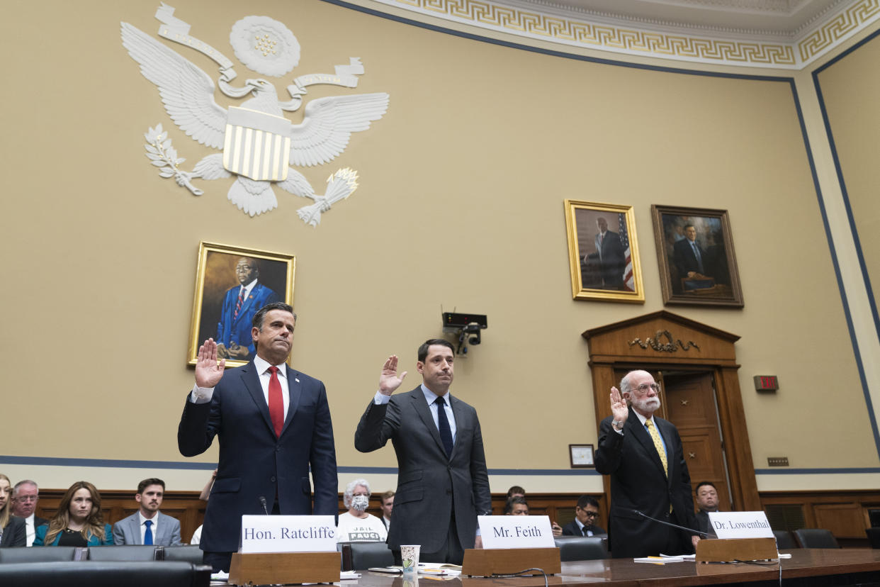 John Ratcliffe, David Feith and Mark Lowenthal raise their hands to swear in to a Select Subcommittee on the Coronavirus Pandemic investigation.