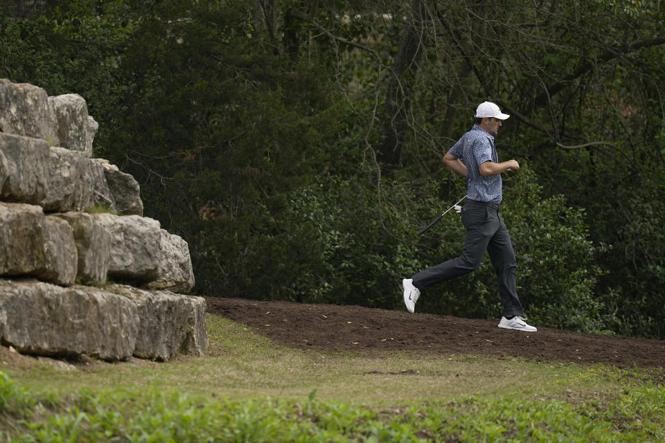 Scottie Scheffler jogs to the on the fourth green during the first round of the Dell Technologies Match Play Championship golf tournament in Austin, Texas, Wednesday, March 22, 2023. (AP Photo/Eric Gay)