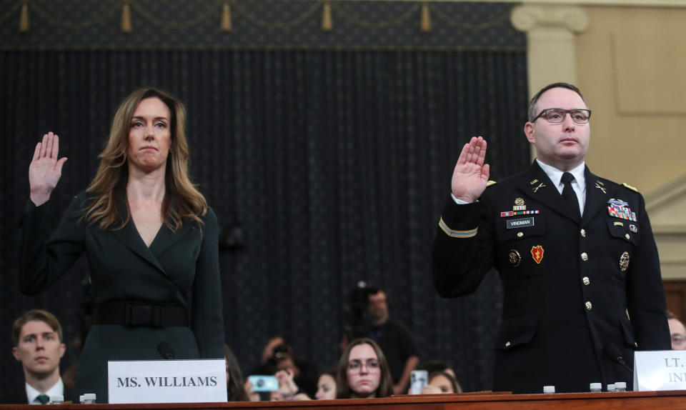 Jennifer Williams, a special adviser to Vice President Mike Pence for European and Russian affairs; and Alexander Vindman, director for European Affairs at the National Security Council, are sworn in to testify before a House Intelligence Committee hearing as part of the impeachment inquiry into U.S. President Donald Trump, Nov. 19, 2019. (Photo: Jonathan Ernst / Reuters)