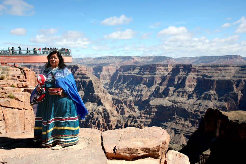 Hualapai tribal member Sylvia Quertz stands at the edge of the Grand Canyon in Grand Canyon West, Ariz., on March 28, 2007. On February 14, 1912, Arizona was admitted as the 48th member of the United States. File Photo by Art Foxall/UPI