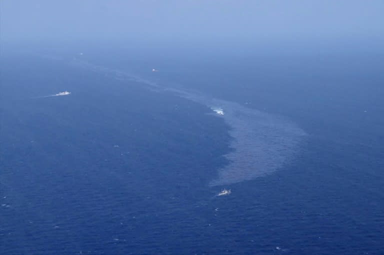 The oil washing ashore differs from the light crude that was the ship's cargo and is likely to be the fuel that was powering the vessel