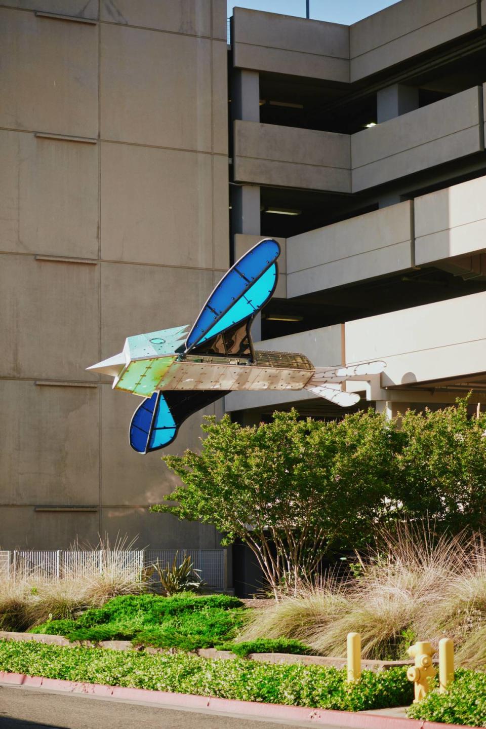 “Flying Gardens” by Dennis Oppenheim features a series of bird sculptures mounted to the facade of the Sacramento International Aiport parking garage.
