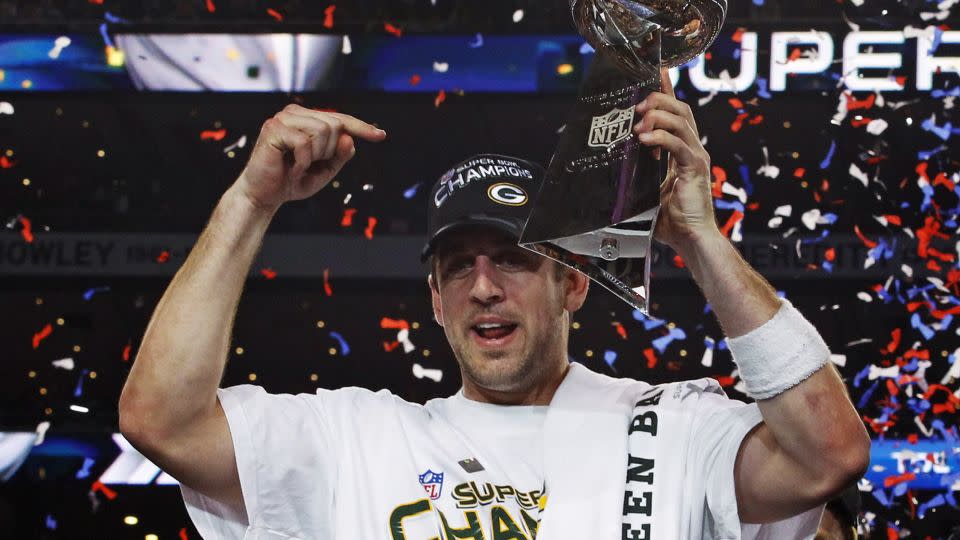 Rodgers holds up the Vince Lombardi Trophy after the Packers defeated the Pittsburgh Steelers in the Super Bowl XLV in Arlington, Texas, on February 6, 2011. - Brian Snyder/Reuters