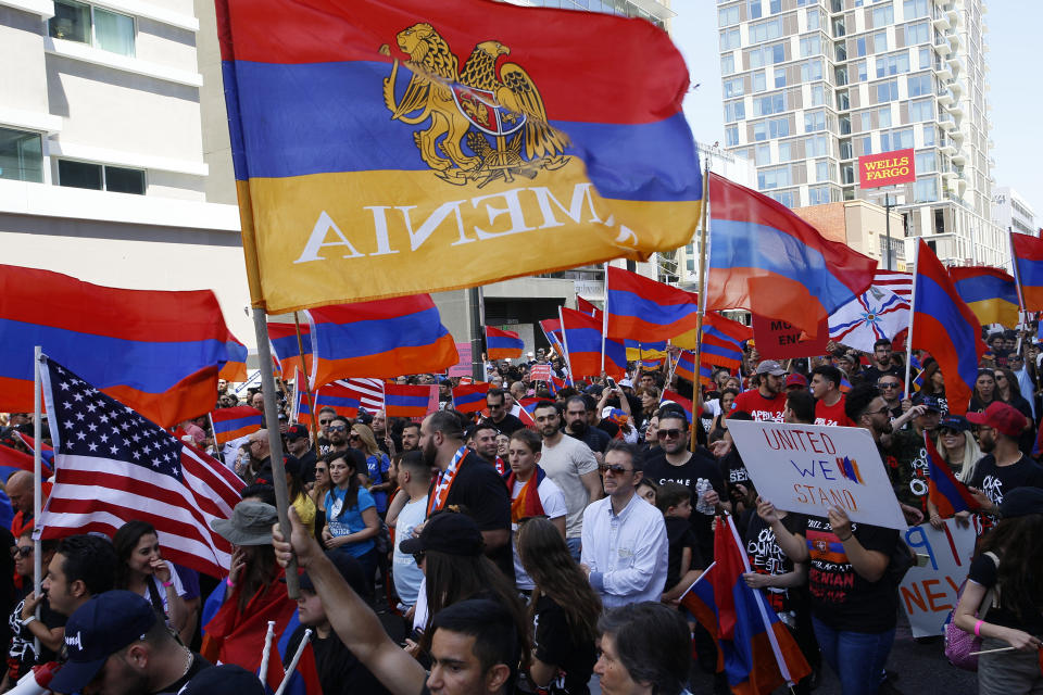 Huge crowds of Armenian Americans march in Los Angeles during an annual commemoration of the deaths of 1.5 million Armenians under the Ottoman Empire Wednesday, April 24, 2019. The march was intended to press demands that Turkey, the successor of the Ottoman Empire, recognize the deaths as genocide. Turkey contends the deaths starting in 1915 were due to civil war and unrest. (AP Photo/Damian Dovarganes)