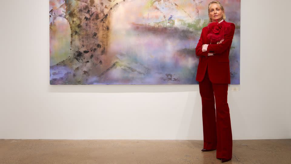 Stone poses with her work "Bayou." - ChiChi Ubina/Courtesy C. Parker Gallery