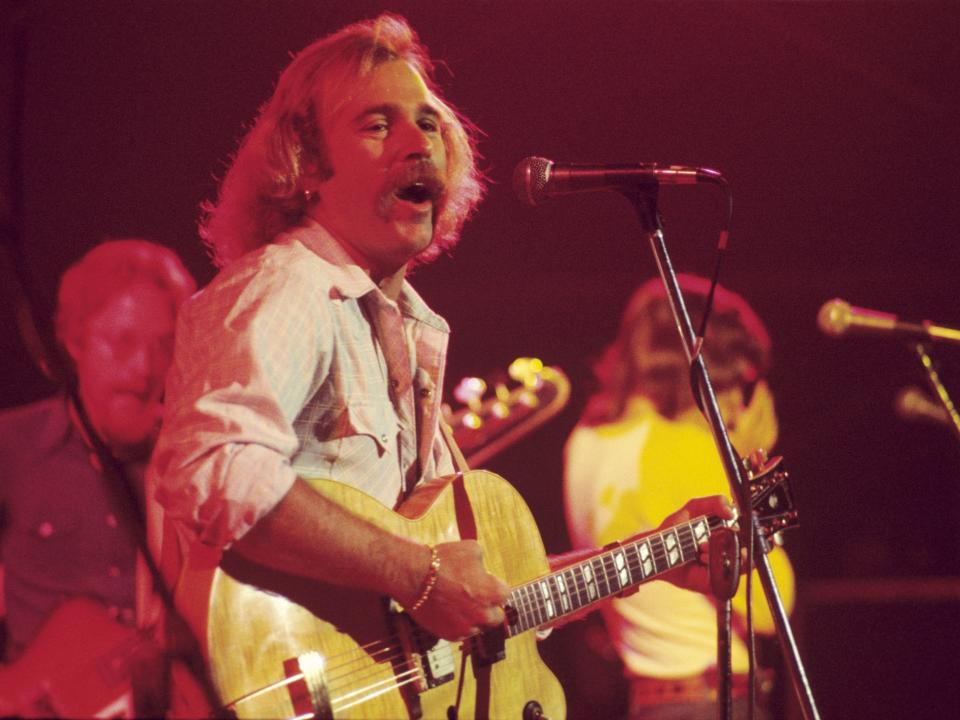 Singer-songwriter Jimmy Buffett performs with The Coral Reefer Band at The Omni Coliseum on September 4, 1976