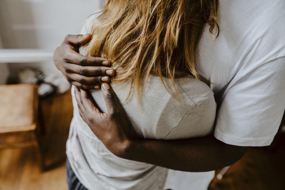 mother and son embracing each other at home