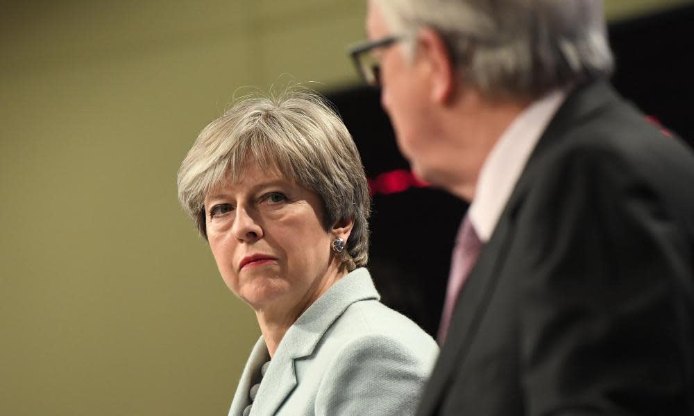 Theresa May with the European commission president, Jean-Claude Juncker.