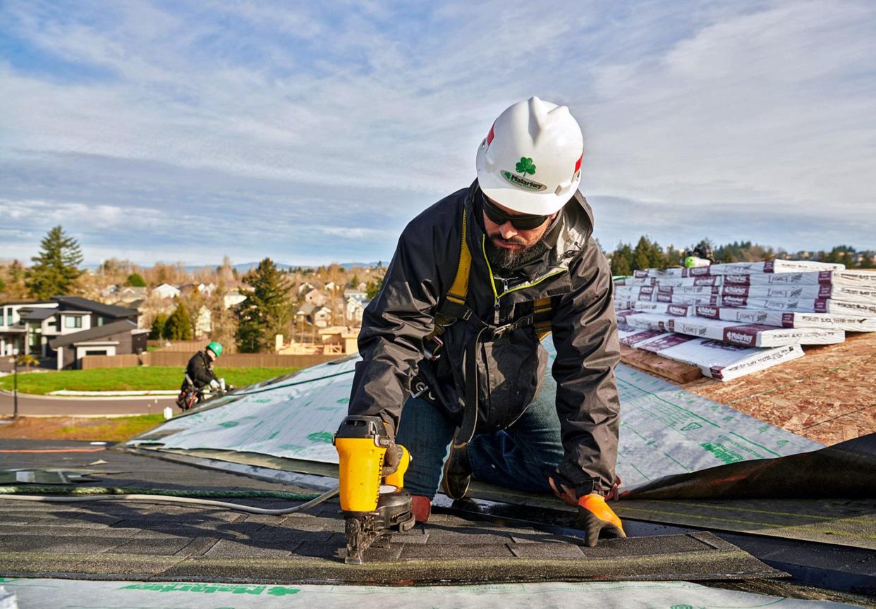 A roofer installs Malarkey asphalt shingles. PROVIDED/MALARKEY ROOFING PRODUCTS