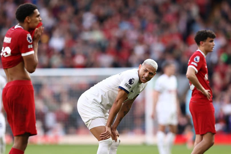 Tottenham Hotspur's Brazilian striker #09 Richarlison (C) reacts during the English Premier League football match between Liverpool and Tottenham Hotspur at Anfield in Liverpool, north west England on May 5, 2024. Liverpool won the match 4-2. (Photo by Darren Staples / AFP)