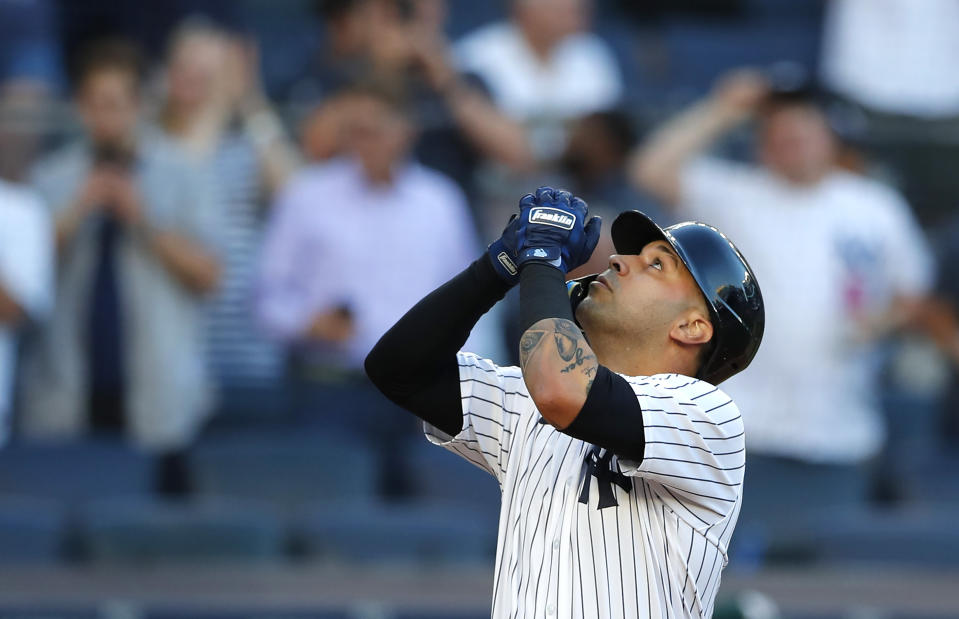 New York Yankees' Marwin Gonzalez (14) reacts after a home run against the Oakland Athletics during the second inning of a baseball game Tuesday, June 28, 2022, in New York. (AP Photo/Noah K. Murray)