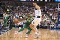 Nov 20, 2017; Dallas, TX, USA; Dallas Mavericks center Salah Mejri (50) guards Boston Celtics guard Kyrie Irving (11) during the second quarter at the American Airlines Center. Jerome Miron-USA TODAY Sports