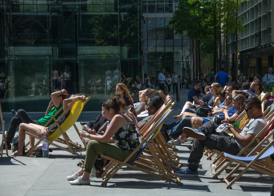 Office workers in London take a lunch break in the sun. Picture: Richard Gray/EMPICS Entertainment