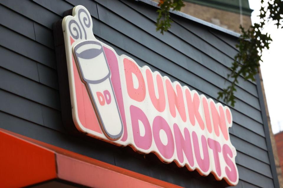 Andrew Scheiner, 40, who is accused of strangling a Dunkin' Donuts worker because the service was too slow is facing an "extended term of imprisonment" for punching the police officer who tried to put him in handcuffs.