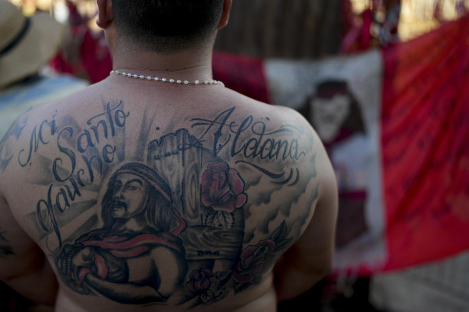 Jorge Zabala visits the sanctuary of Argentina's folk Saint "Gauchito" Gil to commemorate his Jan. 8 death and ask for miracles or give him thanks in Mercedes Corrientes, Argentina, Saturday, Jan. 6, 2024. (AP Photo/Natacha Pisarenko)