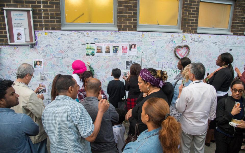 Posters on the wall of some of the missing - Credit: Paul Grover /The Telegraph