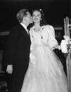 Mickey Rooney kisses co-star Judy Garland at the premiere of Babes in Arms in 1939. The two starred in nine movies together, among them the popular Andy Hardy series. (Peter Stackpole—TIME & LIFE Pictures/Getty Images) <br> <br> <a href="http://life.time.com/culture/marilyn-audrey-kim-novak-and-more-actresses-on-the-brink-of-fame/#1" rel="nofollow noopener" target="_blank" data-ylk="slk:Click here to see the full collection at LIFE.com;elm:context_link;itc:0;sec:content-canvas" class="link ">Click here to see the full collection at LIFE.com</a>