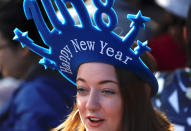 <p>A spectator waits for the annual new year fireworks as part of celebrations on Sydney Harbour, Australia, December 31, 2017. (Photo: David Gray/Reuters) </p>