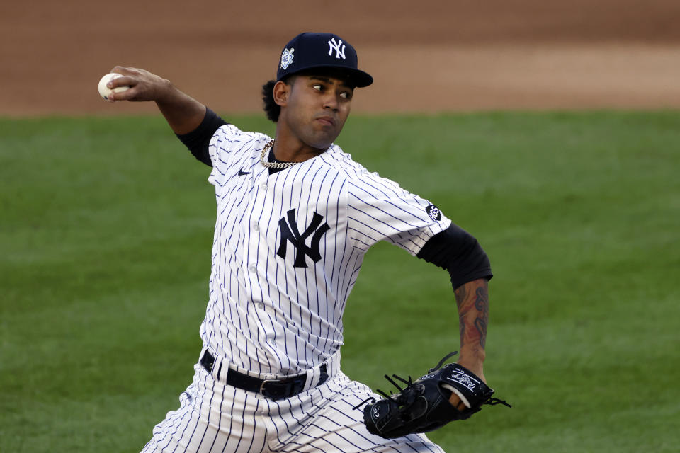 New York Yankees pitcher Deivi García delivers against the New York Mets during the third inning of the second baseball game of a doubleheader, Sunday, Aug. 30, 2020, in New York. (AP Photo/Adam Hunger)