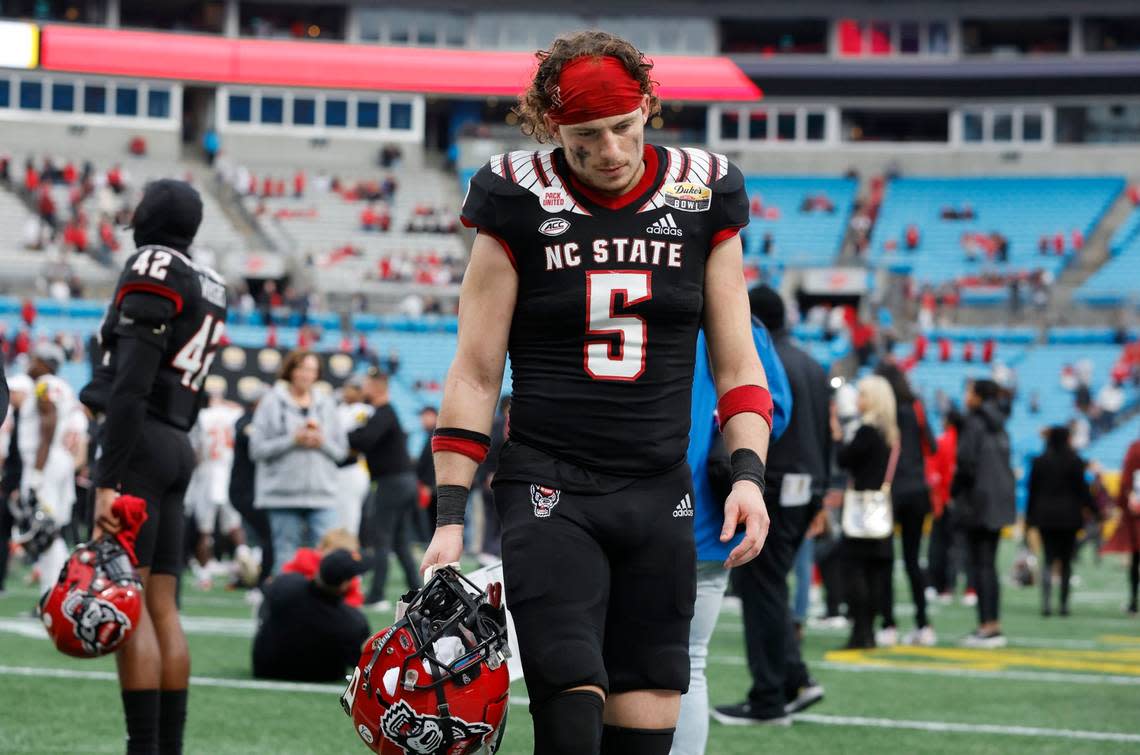 N.C. State wide receiver Thayer Thomas (5) walks off the field after Maryland’s 16-12 victory over N.C. State in the Duke’s Mayo Bowl at Bank of America Stadium in Charlotte, N.C., Friday, Dec. 30, 2022.