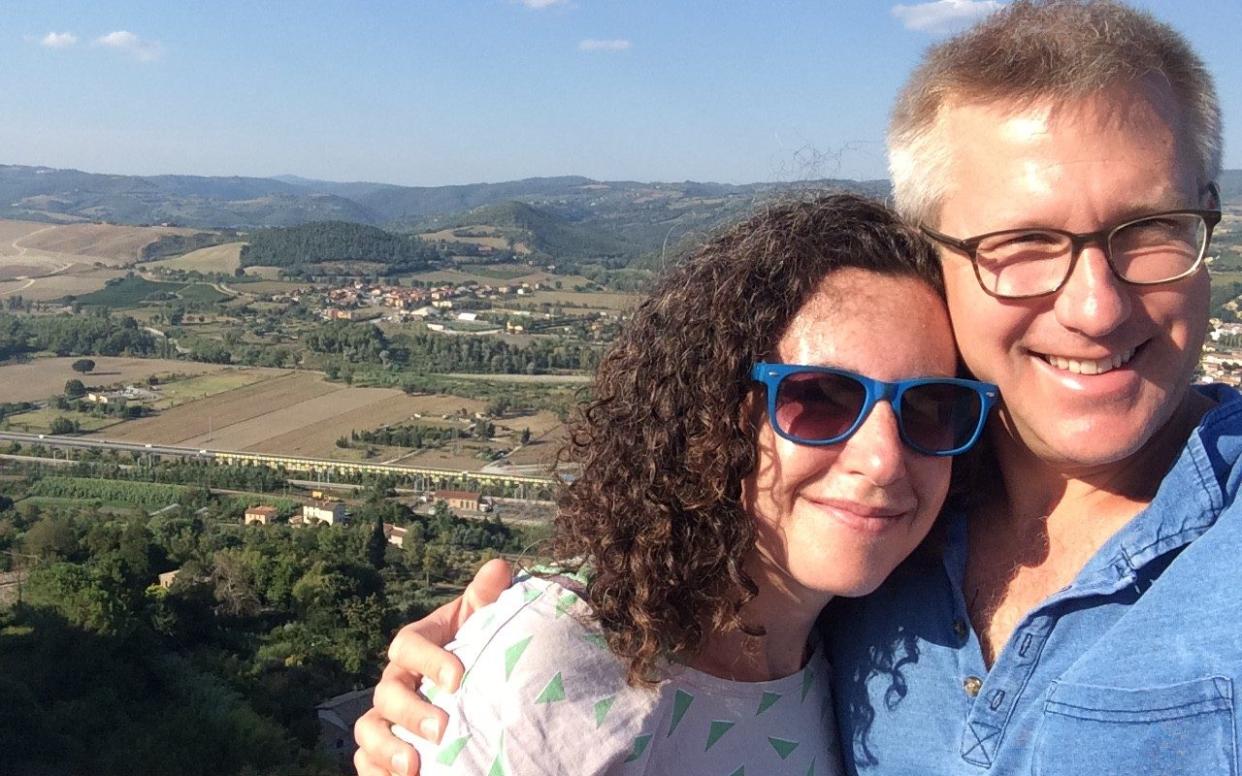 Ellen Himelfarb with her partner on holiday in Italy, trying to enjoy herself