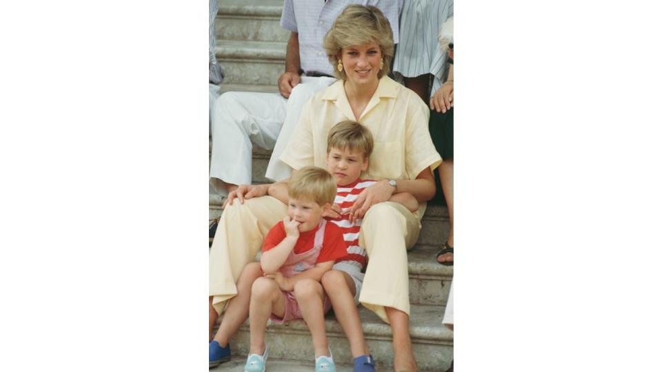 Diana, Princess of Wales with her sons William and Harry during a holiday with the Spanish royal family at the Marivent Palace in Palma de Mallorca, Spain, August 1987