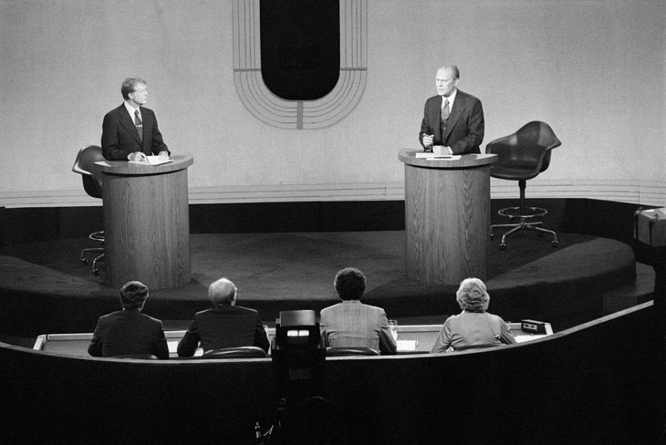 Democratic presidential nominee Jimmy Carter and President Gerald Ford, shown before panel during second debate at San Francisco's Palace of Fine Arts. | Bettmann—Bettmann Archive