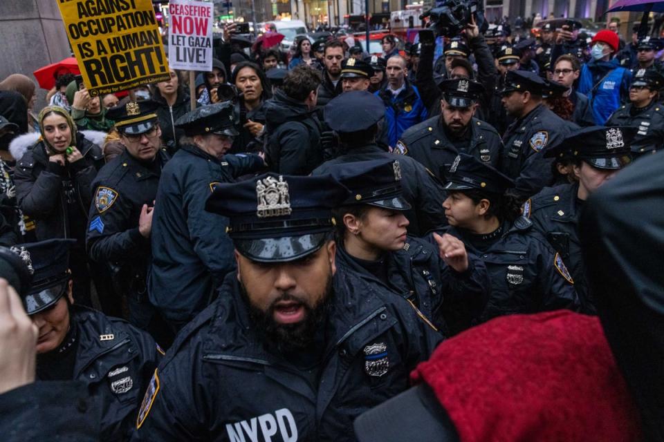 NYPD officers confront Pro-Palestinian demonstrators a few blocks from Radio City Music Hall (Getty Images)