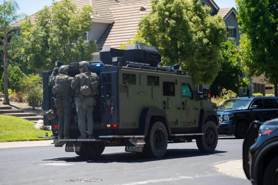 A Placer County Sheriff’s Department BearCat armored vehicle drives down Greenbrae Road in Rocklin on Sunday, July 9, 2023, after a potential sighting of the Mahany Park murder suspect Eric James Abril, who escaped early in the morning from a Roseville hospital.