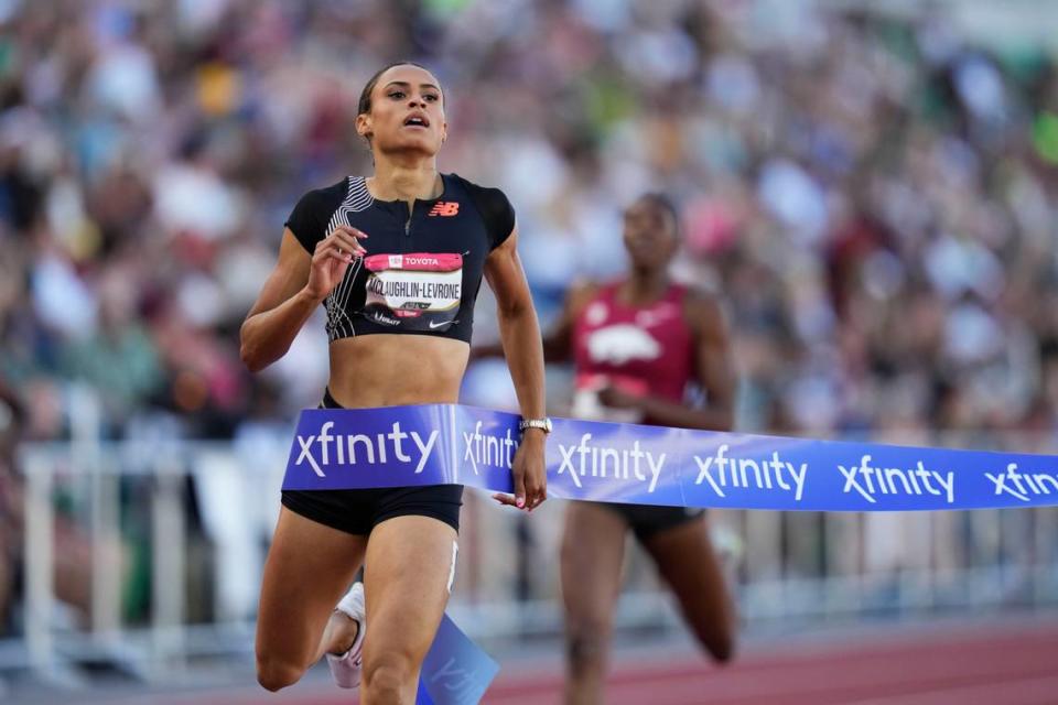 Sydney McLaughlin-Levrone crosses the finish line first in the finals of the 400 meters on Saturday night.