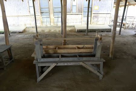 Empty benches are seen in a closed Medecins Sans Frontieres (MSF) clinic in a village at Maungdaw June 6, 2014. REUTERS/Soe Zeya Tun